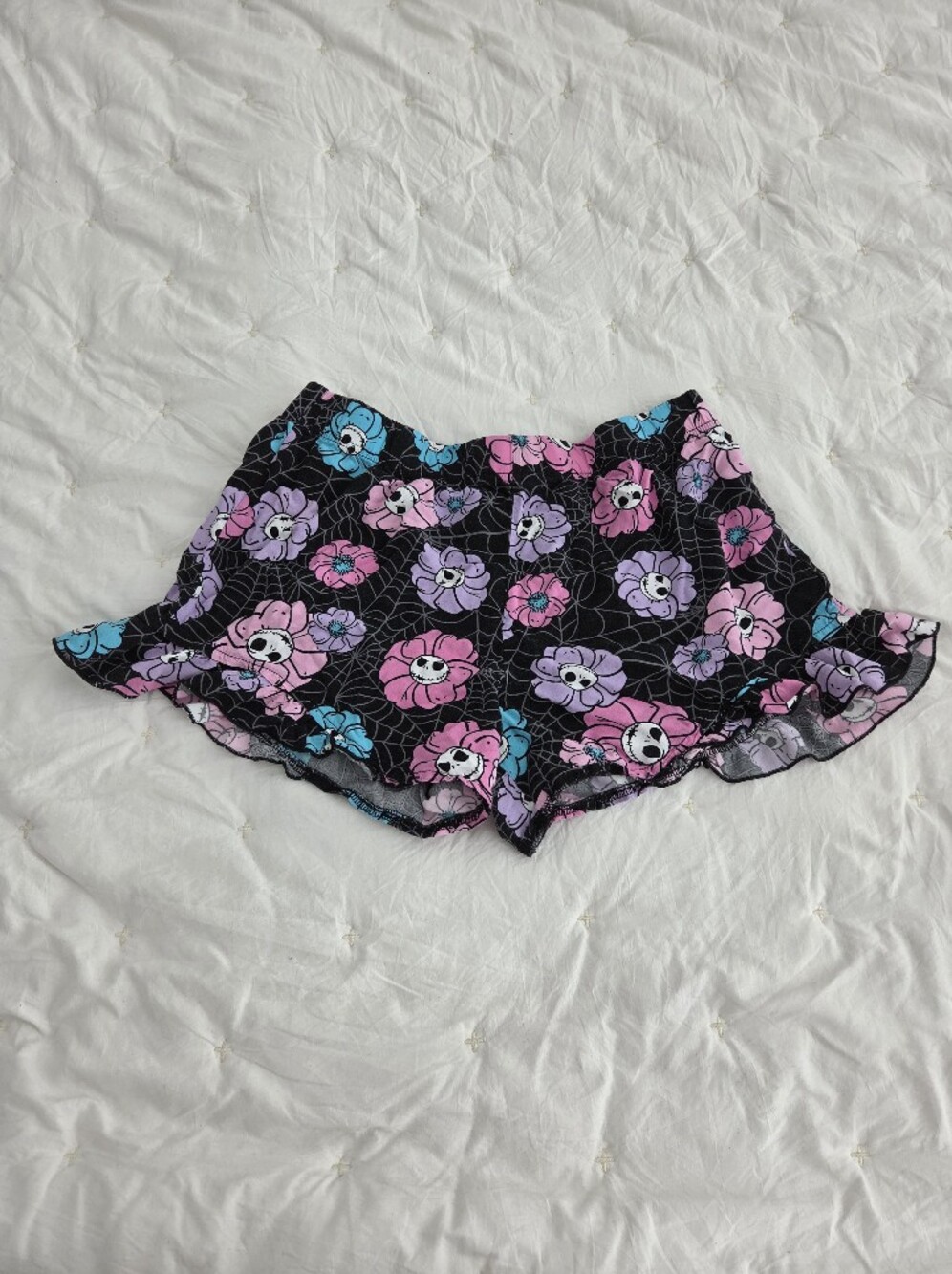 Disney Black Shorts with Pink, Purple & Teal Floral Skull Print